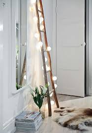A single wooden ladder could be covered on both sides with hardware wire or chicken wire, filled with dirt and a layer of moss, then hung on or leaned against a fence or wall. 7 Reason Why Ladders Are The Coolest Thing To Decorate This Christmas Daily Dream Decor