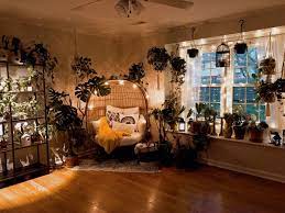 In a normal house or apartment, rooms lit only by artificial light tend to be lower light than in commercial settings and may be left off to save electricity. Target Egg Chair In Plant Room Cozy House Cozy Boho Living Room Boho Living Room