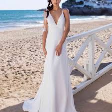Hawaiian wedding dresses are growing in popularity. 31 Beach Wedding Dresses Perfect For A Seaside Ceremony