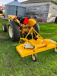 Image result for Yellow 1972 Tractor