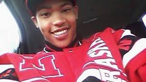 Family members mourn the death of 21-year-old Xavier Bass