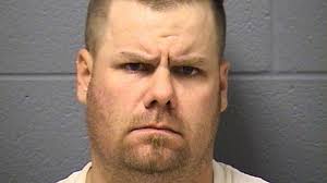 Police officer arrested in Ill., Ind. shootings