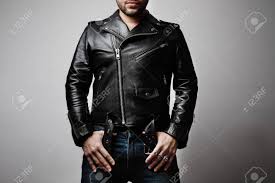 Download Mock Up Of Man Wearing Leather Jacket Stands Frontal In The Studio Stock Photo Picture And Royalty Free Image Image 145653450