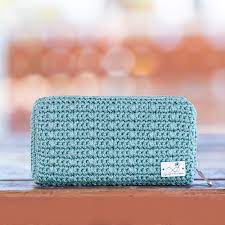 Beautiful detail is on display in these button cuff knitted slippers. Handmade Knitted Wallet With Zipper