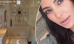 Kim Kardashian reminisces as she visits old house