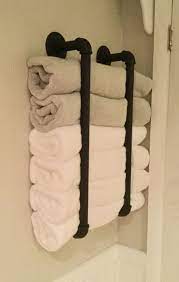 Contemporary style wall hung towel rack with towel bar. Towel Storage Bathroom Storage Solutions Small Bathroom Organization Bathroom Towel Storage