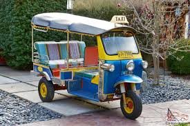 Taxi sign on the tuk tuk roof at khao san road in bangkok, thailand. Tuk Tuk Taxi From Thailand Three Wheeler Rickshaw And Pedicab Very Very Rare