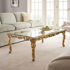 Useful and elegant, coffee tables are more than just a pretty piece of furniture in front of your couch. Carved Table Carved Coffee Table In Gold Leaf Finish