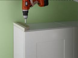 fitting kitchen unit cornice and pelmet