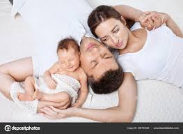 Parents Cuddling Newborn Baby Bed Home Mom Dad Baby Happy Stock Photo Image By C Liudmila Fadzeyeva Gmail Com 206743506