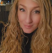 April licensed massage therapist