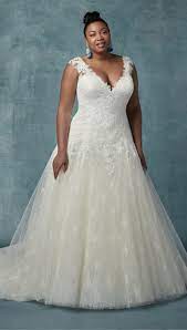 Another Plus Size Dress From Maggie Sottero This Stunning Dropped Waist Bodice With A V Neck Plus Wedding Dresses Ball Gowns Wedding Wedding Dresses Plus Size