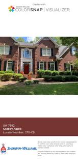 Shades of purple may not be the first color that comes to mind when choosing a front door color to match your red brick. Front Door Paint Color