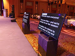 A booth projecting above the floor in the front of a stage where the prompter sits; Prompter Confidence Monitor Dallas Prompter