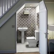 8 Mind Blowing Under Stair Powder Room Designs To Inspire You Talkdecor Bathroom Under Stairs Room Under Stairs Bathrooms Remodel