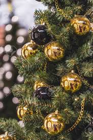 Check out these decorating ideas to turn your christmas tree into a holiday masterpiece. Decoration Christmas Tree With Plenty Of Gold And Black Balls Stock Photo Picture And Royalty Free Image Image 66286139