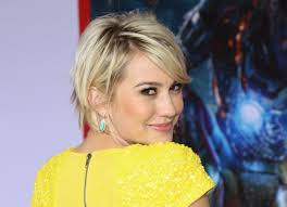 Chelsea Kane's short bob with flipped out ends and feathered back layers