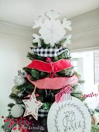 Large gold bow tree topper ($12): 15 Brilliant Diy Tree Toppers Making Lemonade