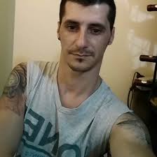 Man, 33, in court charged with murdering charity fundraiser, 86, found dead  next to her critically injured husband