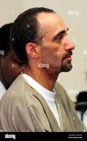 Robin Anthony Hoose listens as charges against him are read during his  arraignment Friday, July 20, 2007, in district court in Greenfield, Mass.  Hoose was ordered held without bail