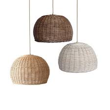 The woven material gives a warm, welcoming glow and casts decorative light patterns in the room. Rattan Basket Light Bamboo Ceiling Lamp Wood Chandelier Wicker Etsy In 2021 Wood Ceiling Lamp Basket Light Rustic Pendant Lighting