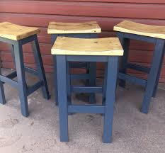 This stool requires some assembly upon arrival. Saddle Seat Bar Stools Counter Height Stools Wood Custom Etsy In 2021 Wood Bar Stools Saddle Seat Bar Stool Bar Stools