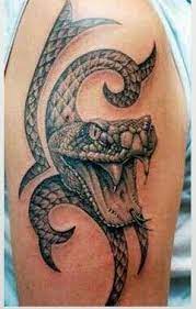 Pin By Crimson Vega On Tattoos And Piercings Snake Tattoo Design Tattoos Serpent Tattoo