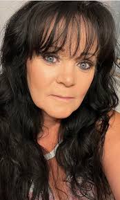 Should I stop coloring my hair and go grey?