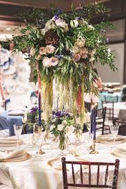 Tall Dramatic Centerpiece With Greens And Flowers Draping Chicago Florist Wedding Decorations Event Decor