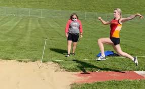 Garrett sets 400-meter mark, Charleston wins 8 events in dual track meet