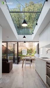 Skylights bring natural light into areas that normally wouldn't have windows. Lights Clever Skylight Kitchen Modern Kitchen Design Modern Houses Interior