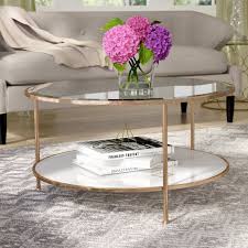 🔨🍷 hand crafted, shanty2chic inspired side table & wine rack for the living room!! 160 Luxe Looks And A Streamlined Frame Make This Chic Coffee Table A Living Room Must Have Made From Stainl Couchtisch Stein Wohnzimmertische Couchtisch Rund