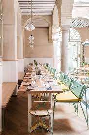 Restaurant Dining Chairs Beautiful Industrial Style Restaurant With Mint Green And Pastel Yellow Dining Cha Restaurant Interior Cafe Design Luxury Restaurant