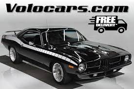 Real cuda with stunning colors. 1973 Plymouth Barracuda Volo Auto Museum