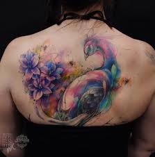 Peacock tattoos are worn by both sexes and designed in a variety. Peacock Flowers Girls Back Tattoo