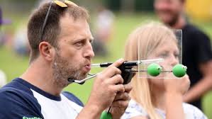 Annual Pea Shooting World Championships held in Witcham raises more than  £2,500 for village and is featured