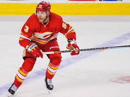 Sam bennett #93 of the calgary flames fights for the puck against michael chaput #45 of the vancouver canucks during an nhl game at scotiabank saddledome on dec. Flames Bennett Seeking Trade Thescore Com