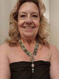 I made up this 20 inch necklace from one of my ceramic house beads and some  beads from AG