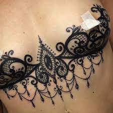 Lace Sternum Tattoo Tattoo Ideas And Inspiration Lace Skull Tattoo Lace Tattoo Design Henna Inspired Tattoos