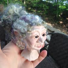 Help with sculpting a mid-air figure in polymer clay