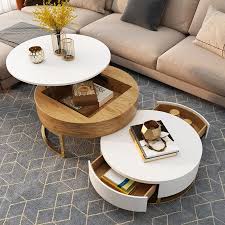 This unique coffee table has an extending lift top desk that pulls up and out to provide a floating raised work surface perfect for smaller offices or dorm. Modern Round Coffee Table With Storage Lift Top Wood Coffee Table With Rotatable Drawers In White Natural