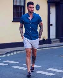 Men S Blue Denim Short Sleeve Shirt Light Blue Shorts Dark Brown Leather Tassel Loafers Dark Brown Leather Watch Mens Shorts Outfits Mens Summer Outfits Short Men Fashion