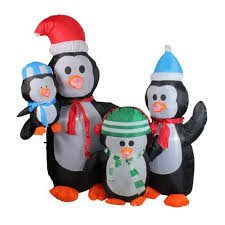 The penguin is a hard enamel charm with metal detail and comes on a loop of festive red. Northlight 5 Lighted Black And Orange Inflatable Penguin Family Christmas Yard Art Decor Target