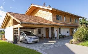 Massivholzhaus Mit Carport Haus Haus Bauen Wohnhaus