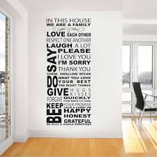 The laundry room loads of fun wall art decal. In This House Wall Decal Trendy Wall Designs