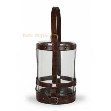 Candle holders are useful to secure them and to protect your surfaces. Black Leather Strap Hurricane Candle Holder Small Buy Black Leather Strap Hurricane Candle Holder Small Silver Candle Lanterns Manufacturer Decorative Metal Lanterns Candle Lanterns Large Leather Glass Hurricane Black Leather Black Hanging Candle