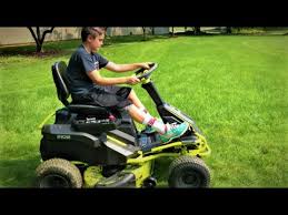 Powered by 100ah lead acid batteries and with 2 and a half hours of run time this mower is a green alternative to traditional gas riding mowers. Ryobi Electric Riding Lawn Mower Review Youtube