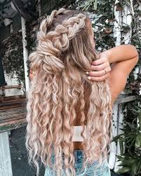 Imagine you are traveling to your favorite music festival and add a loose messy bun to your hairstyle. Amazing Half Up Half Down Hairstyles For Long Hair