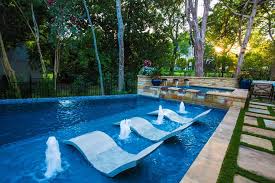 20 Pool Chairs That Make Your Backyard Feel Like A Resort Pool Water Features Swimming Pool Designs Backyard Pool Designs