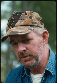 John Bowman, ex-miner and ex-moonshiner, now self-employed seller of  antiques, used coal and wood stoves, and tools from his garage